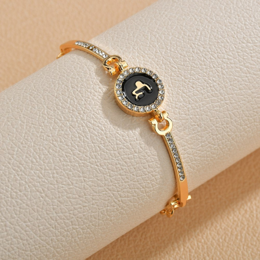 Wholesale Drip Oil 12 Constellation Gold Rhinestone Alloy Bracelet
